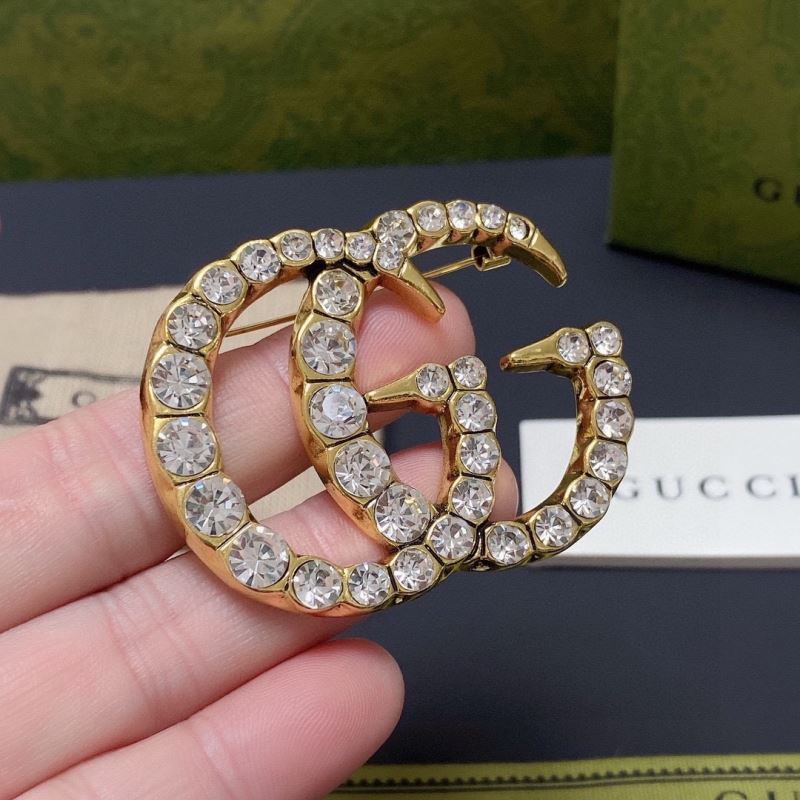 Gvc*1 brooches